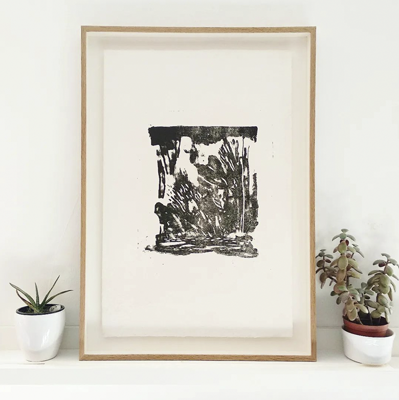 monochrome abstract print floated in slimline solid oak frame