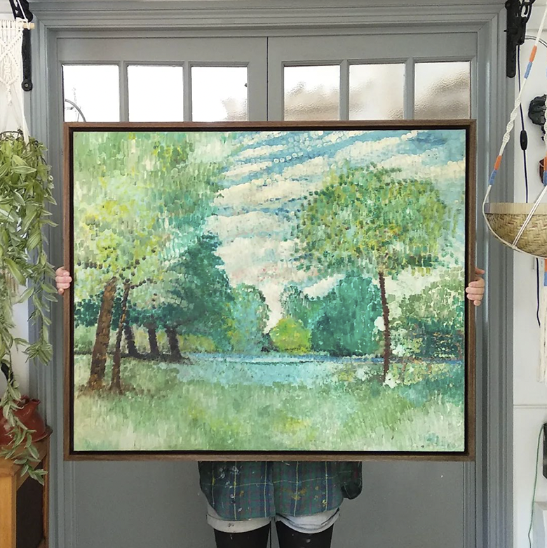  impressionist style painting of trees by lake framed in mid brown tray style frame