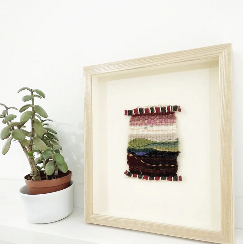 woven cloth framed in pale ash frame